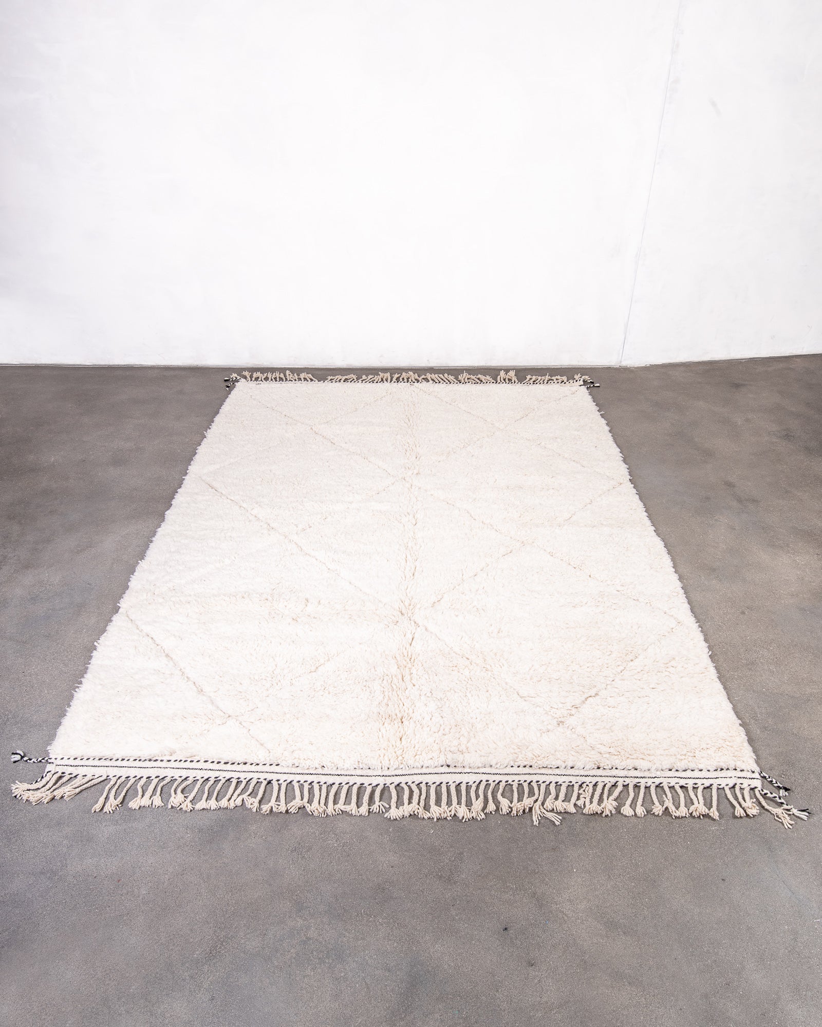 Modern, designer, handcrafted Berber rug from Morocco. Beniourain carpet with beautiful colours and patterns and fluffy wool texture.